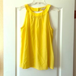 Sleeveless yellow blouse